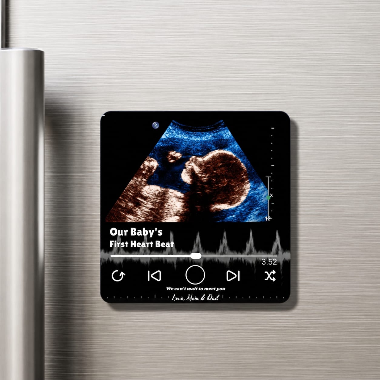 Hand holding a glossy custom photo fridge magnet keepsake